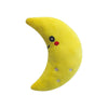 Yellow crescent moon plush dog toy with an embroidered face and silver star details on a white background.