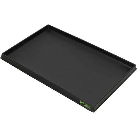 Black rectangular plastic tray with raised sides for holding an indoor dog grass pad.