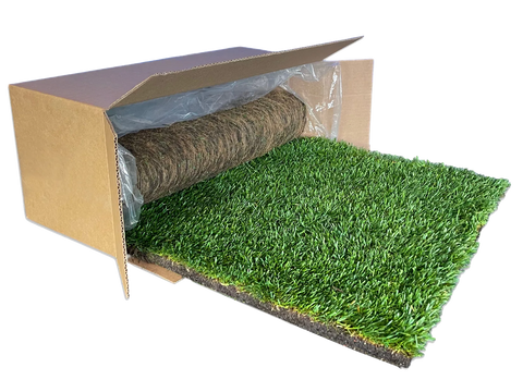 XL real dog grass pee pad unrolling from its shipping box, showing fresh green potty grass.